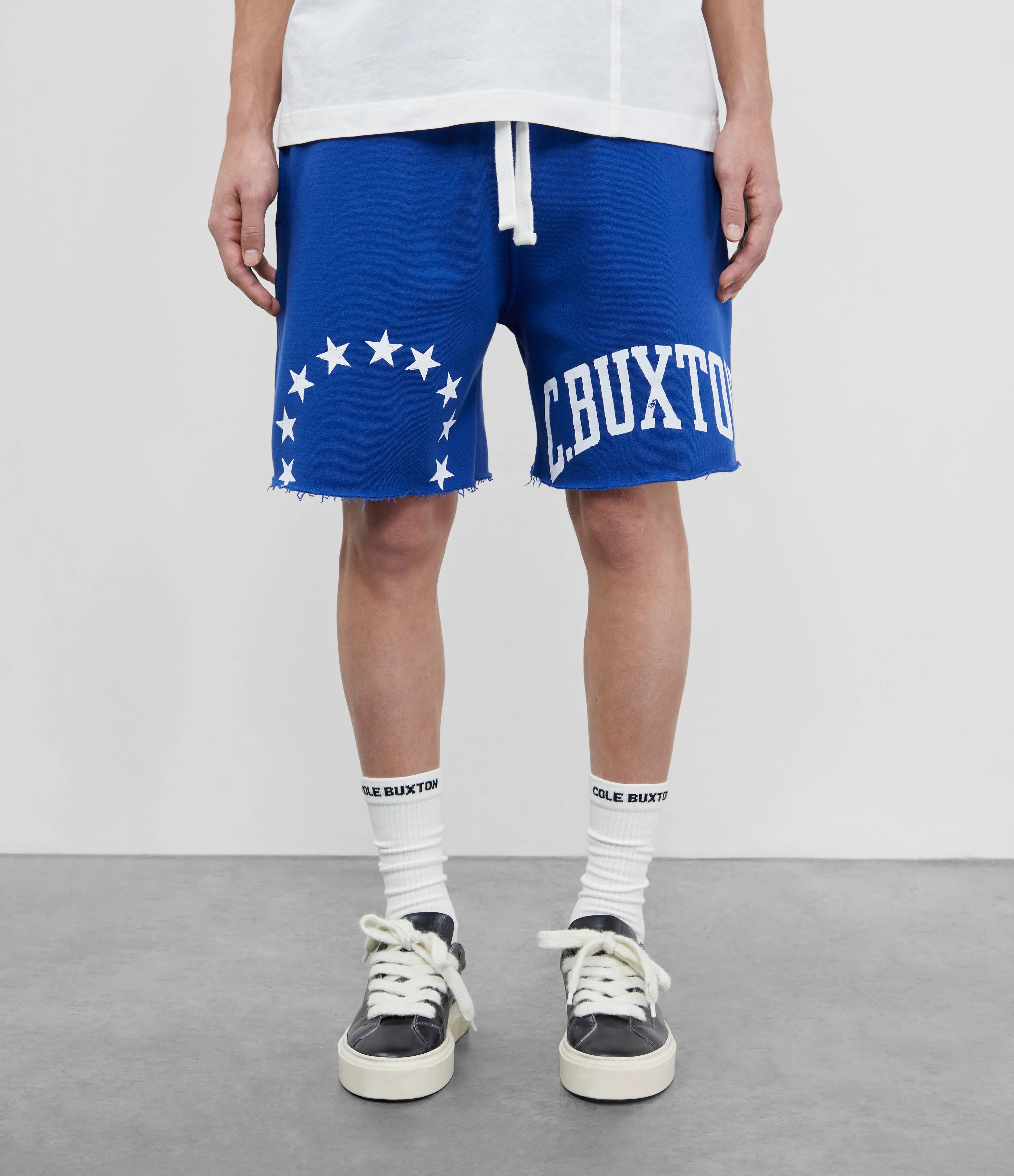 CUT OFF VARSITY SHORTS